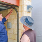 How do you maintain the security of your garage door with regular repairs?